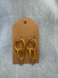 Oval interlocking gold earrings